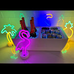 REVO Tropical Party Pack Neon Lights make any party more festive with their bright fun colors.  They operate on 3 AA batteries and also come with a USB cord and can run off of that.  Top switch for easy on/off.  Tropical theme set of 4 different lights.  Flamingo is 12.5"h by 6.5"w. Palm Tree is 11.5"h by 7"w. Pineapple is 11.5"h by 6"w.  Toucan is 9.5"h by 5.5"w.  